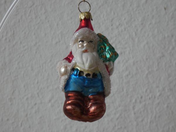 Weihnachtsmann mit Bäumchen